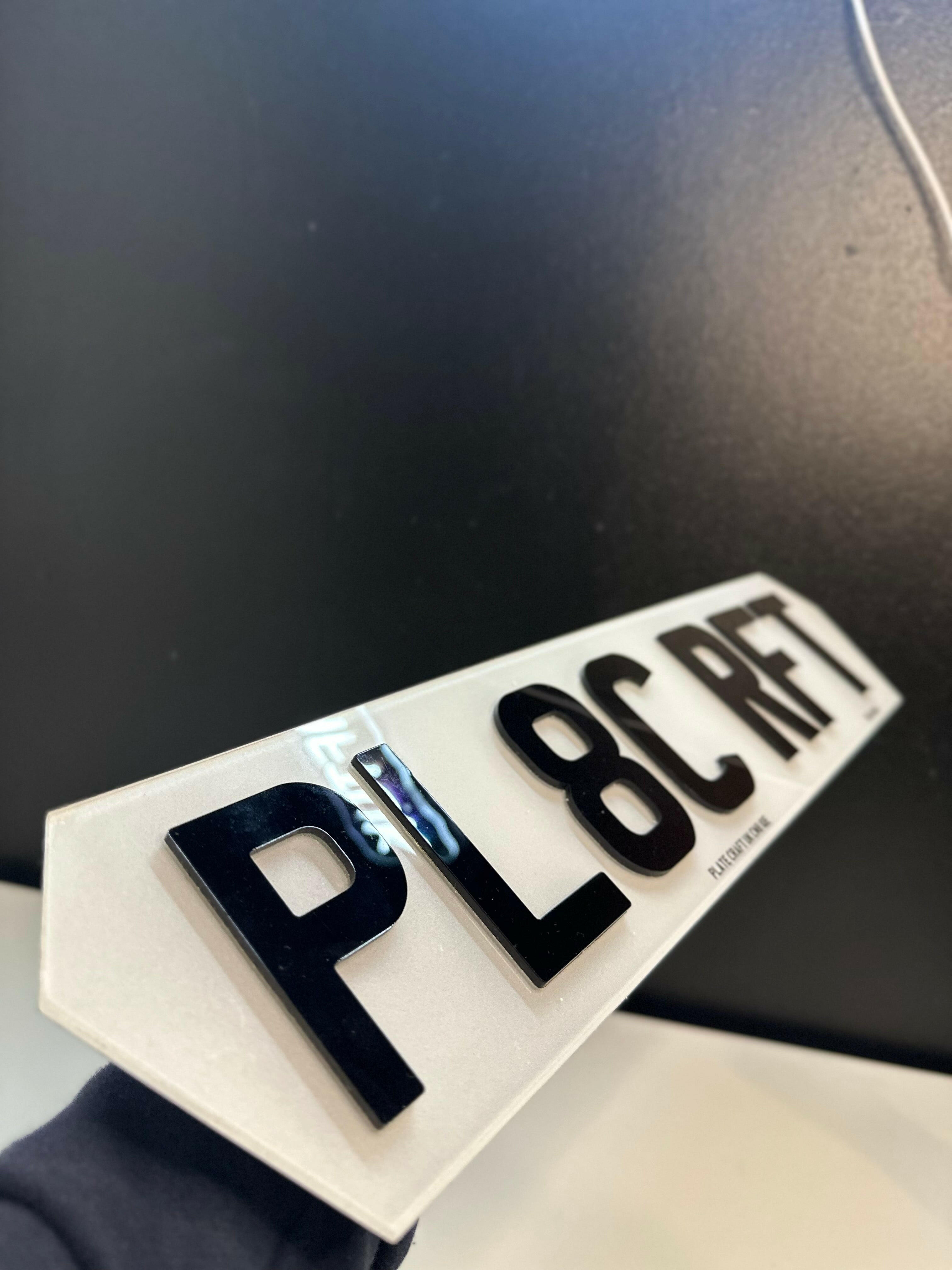 Road legal hex number plate with 4D acrylic characters on a modern vehicle
